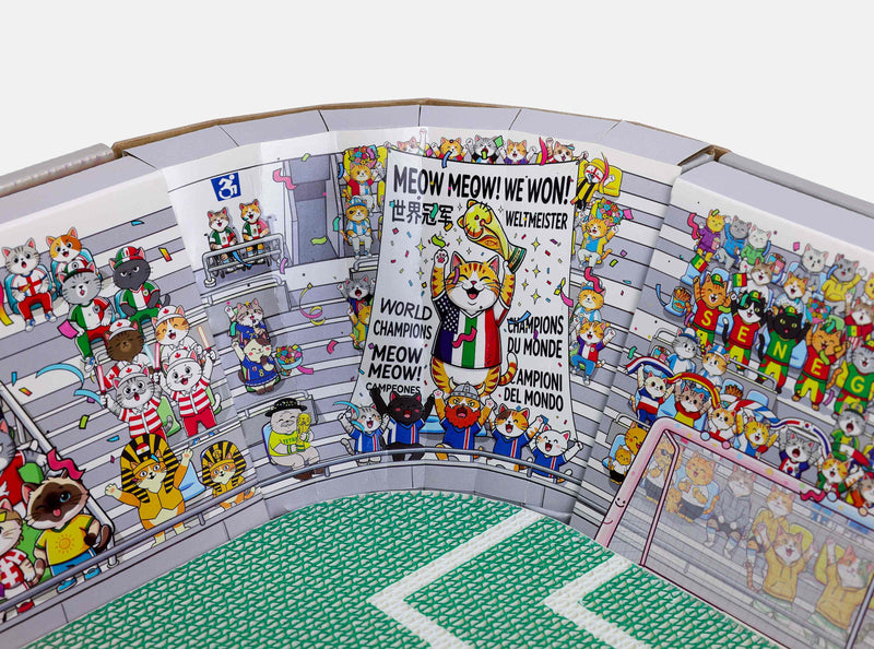  Cat fans celebrating a championship victory with a giant tifo display in the stadium